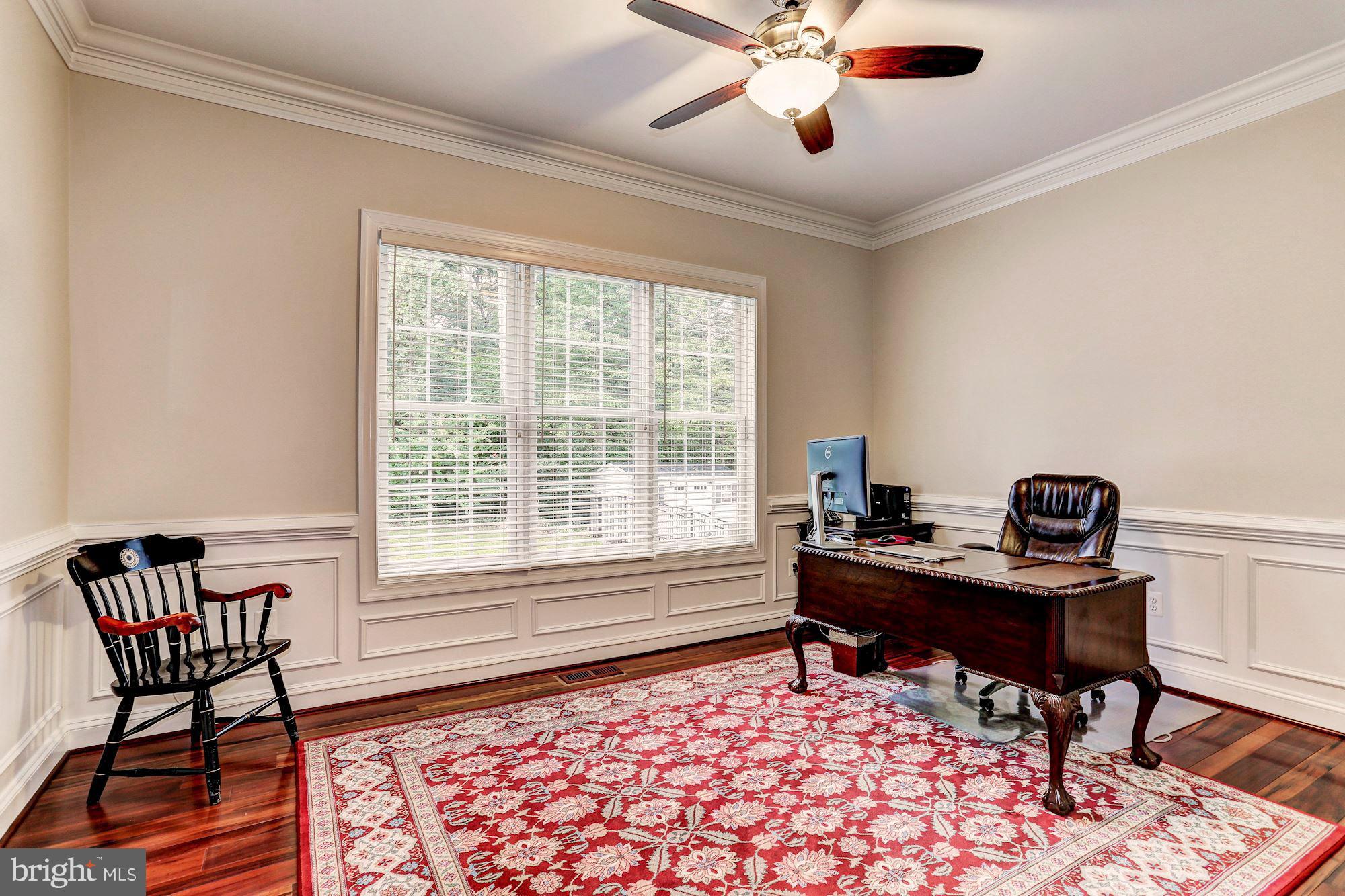 7111 Granberry Way Springfield, VA 22151 - Photo 13 of 30 a workspace with wooden floor and a window