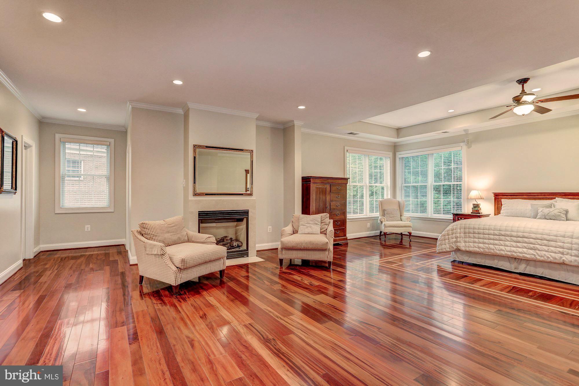 7111 Granberry Way Springfield, VA 22151 - Photo 16 of 30 a living room with furniture and a wooden floor