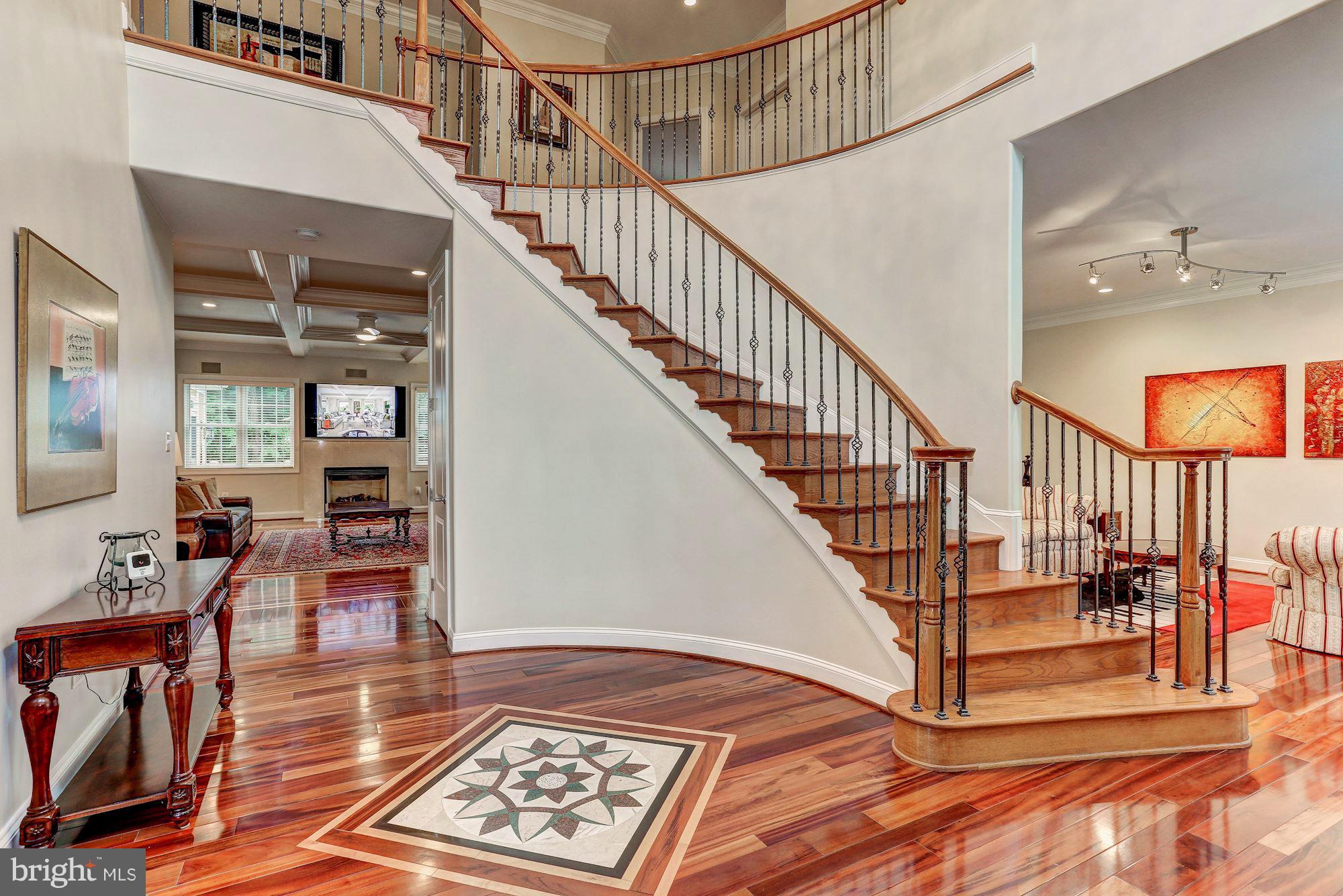 7111 Granberry Way Springfield, VA 22151 - Photo 3 of 30 a view of entryway and hall with dining room
