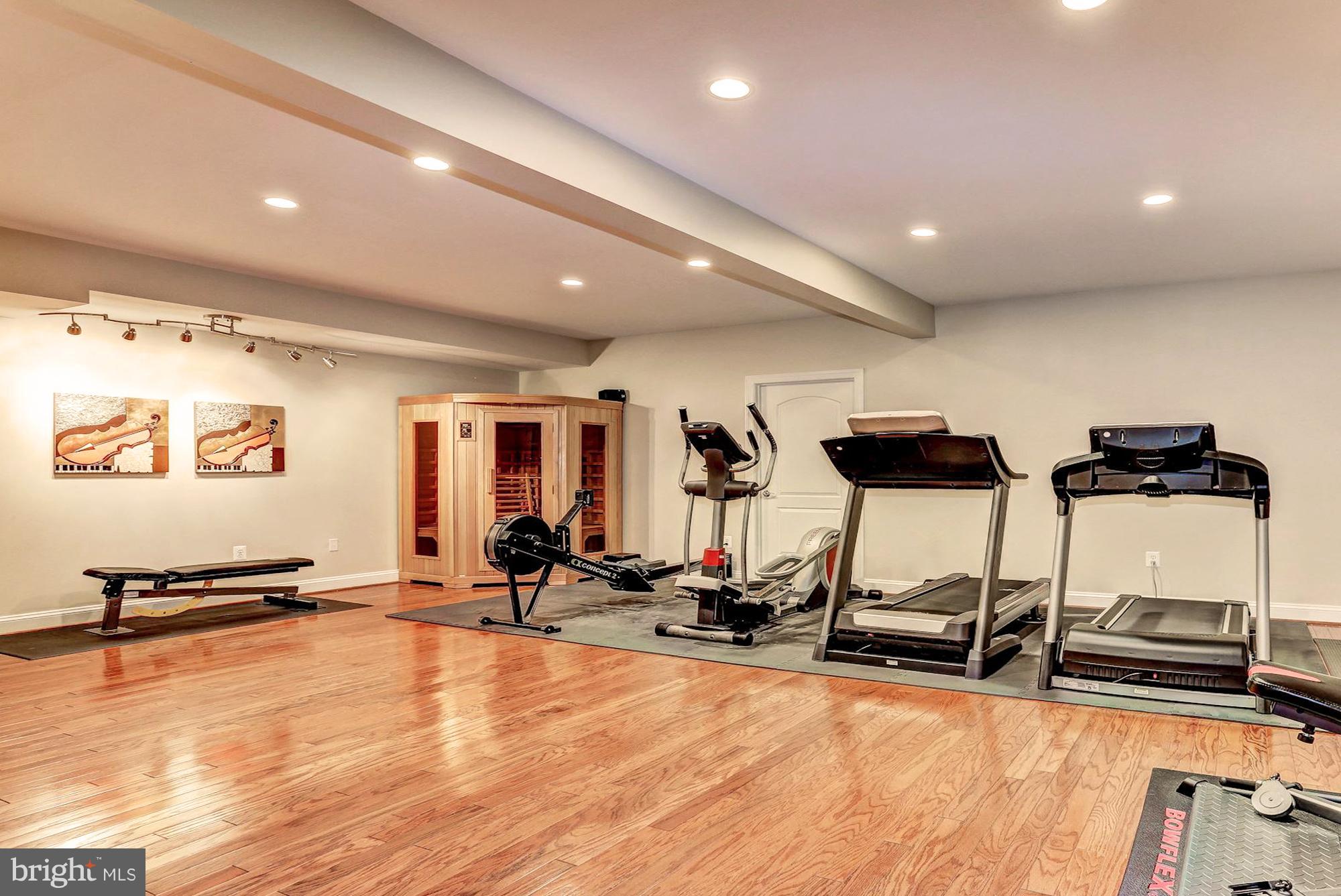 7111 Granberry Way Springfield, VA 22151 - Photo 28 of 30 a view of a room with gym equipment