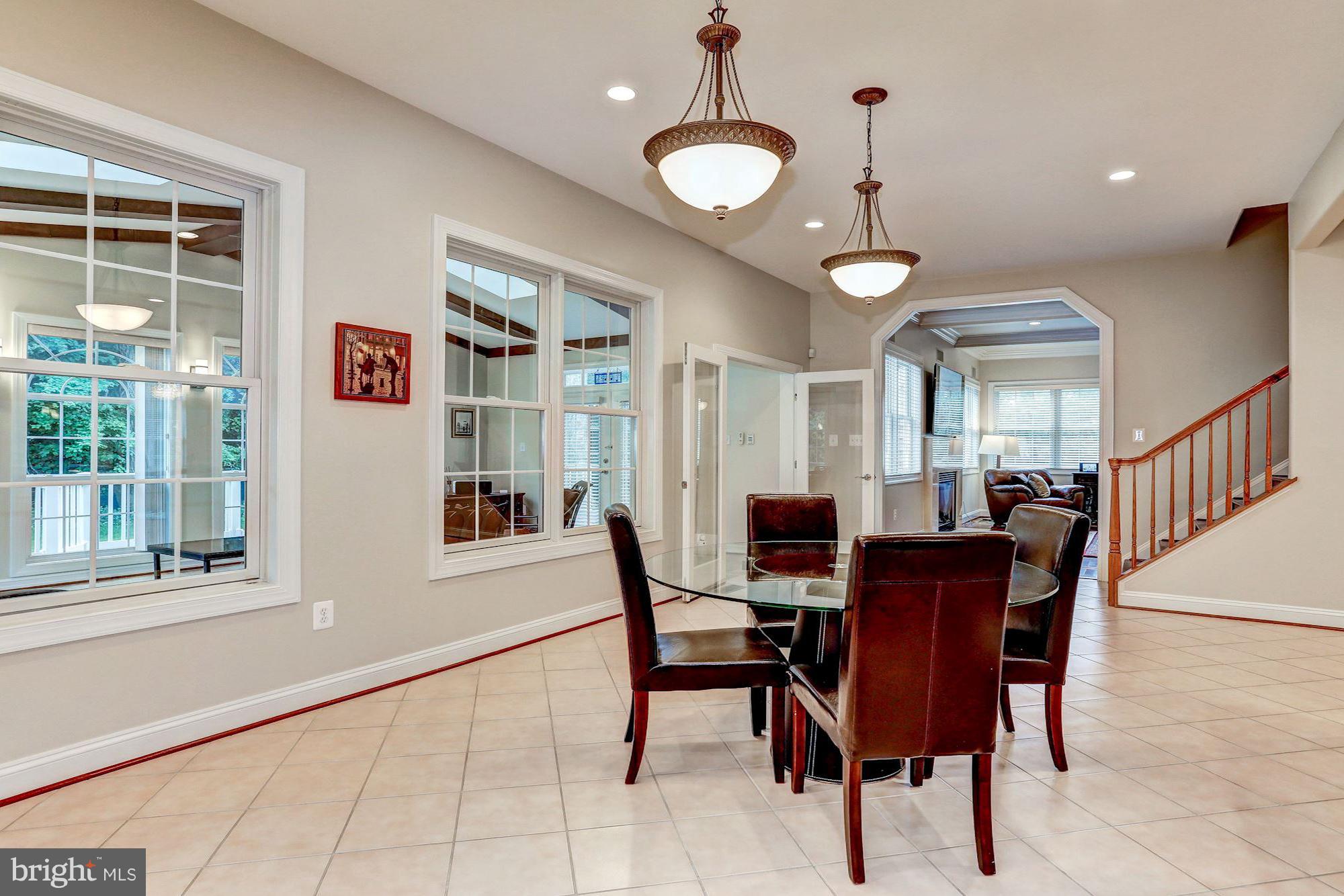 7111 Granberry Way Springfield, VA 22151 - Photo 10 of 30 a view of a dining room with furniture and window