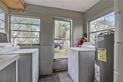 a view of living room with washer and dryer