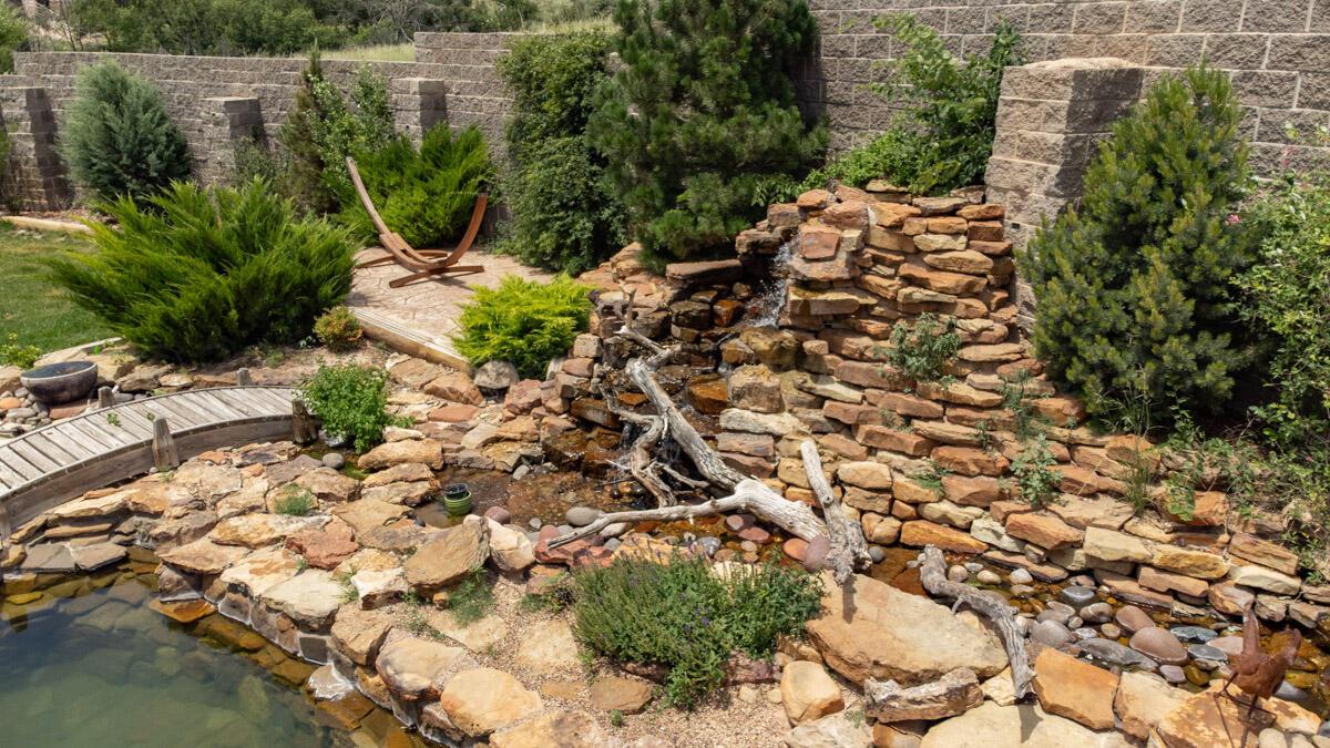 21401 Hope Road Canyon, TX 79015 - Photo 81 of 112 21401_Hope_Rd_073_Backyard_Waterfall