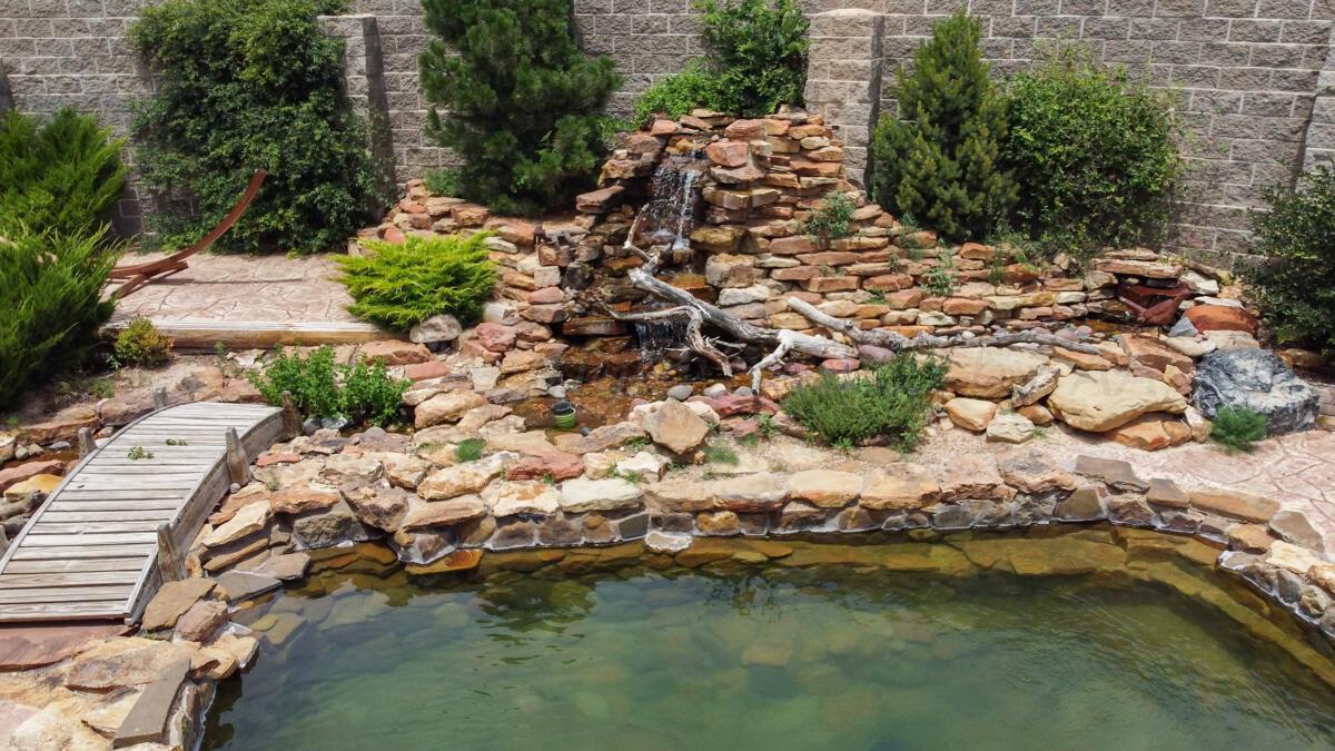 21401 Hope Road Canyon, TX 79015 - Photo 82 of 112 21401_Hope_Rd_075_Backyard_Waterfall