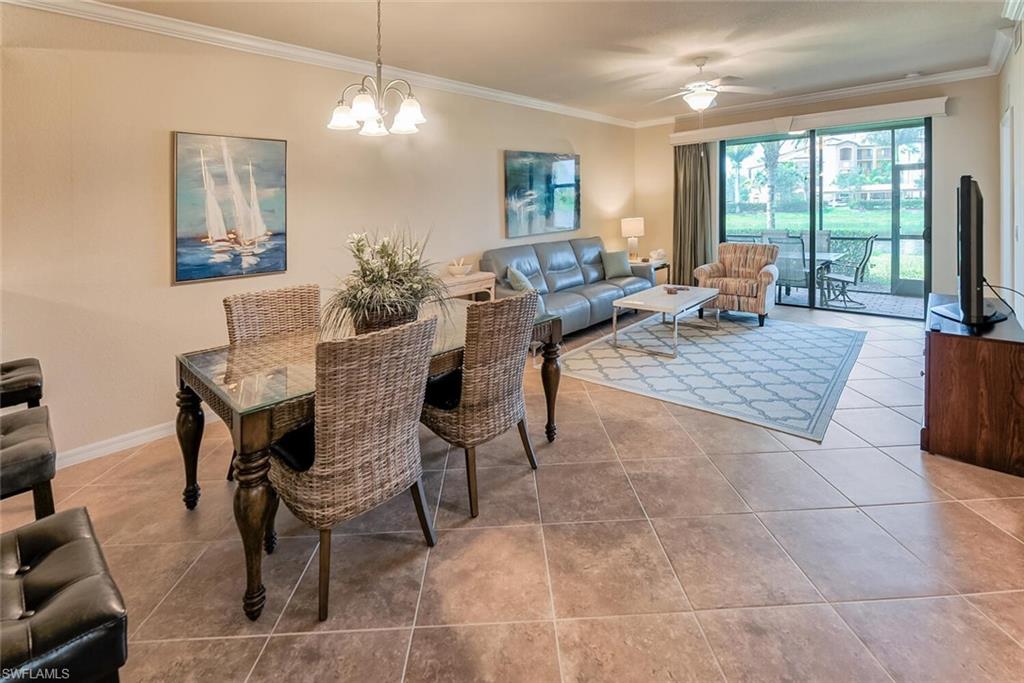 9528 Avellino Way, Unit 2515 Naples, FL 34113 - Photo 5 of 35 a view of a livingroom and dining room