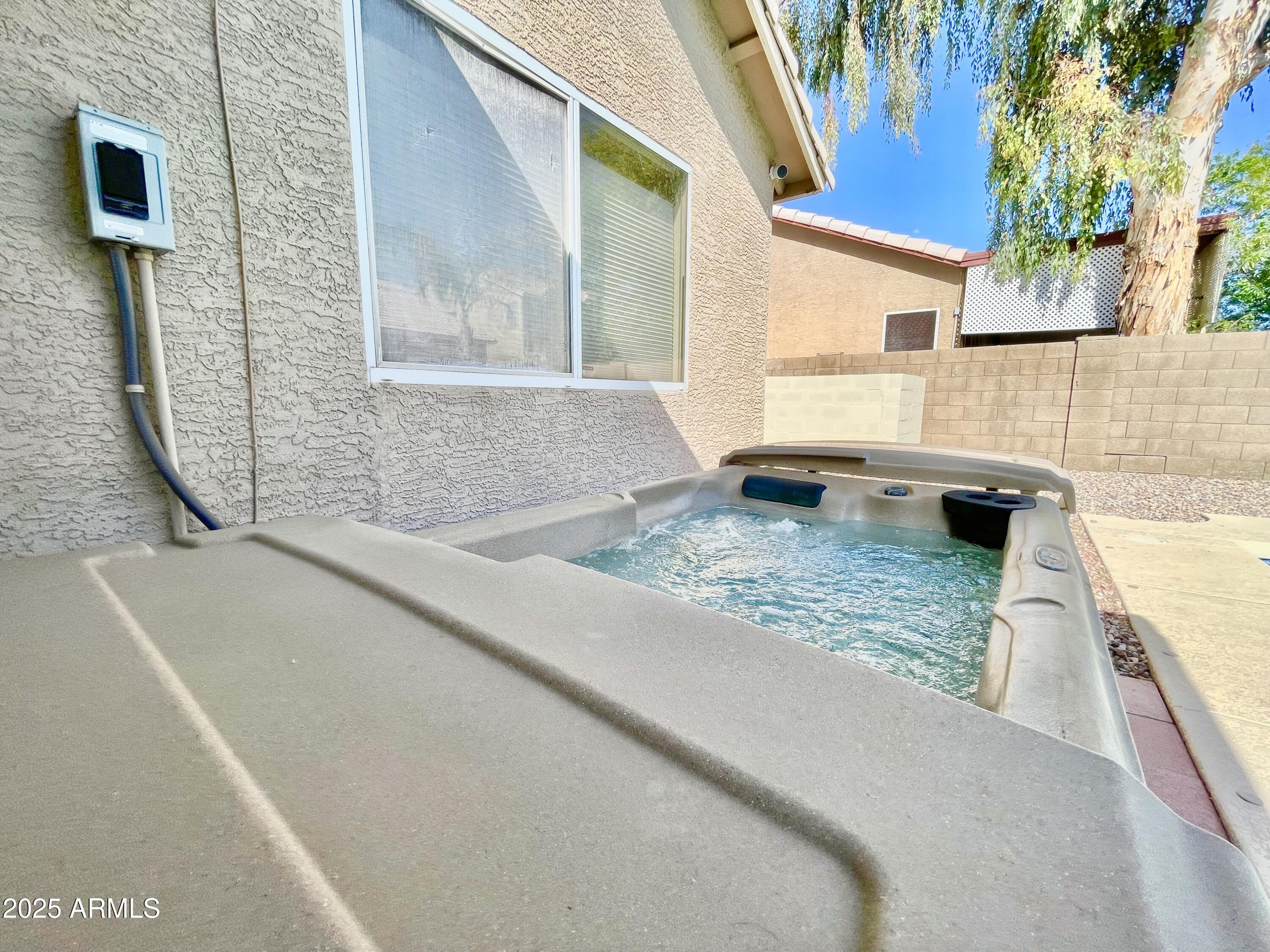 2735 East Harwell Road Gilbert, AZ 85234 - Photo 29 of 43 a view of a house with a sink and a potted plant