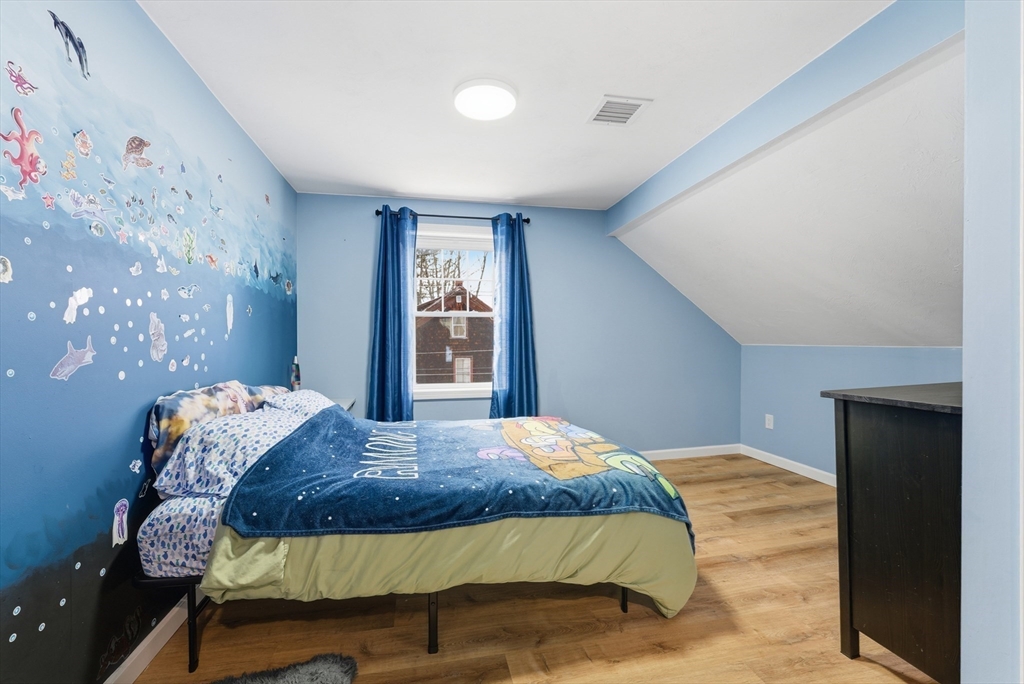 160 Cottage Street Athol, MA 01331 - Photo 19 of 35 a bedroom with a large bed and a window