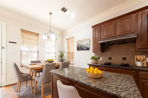 a kitchen with granite countertop lots of counter top space