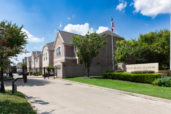 a view of a street with houses