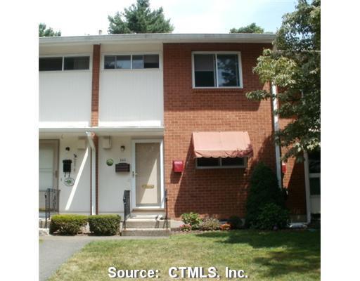 240 Centerbrook Road, Unit 240 Hamden, CT 06518 - Photo 1 of 1 a view of a house with small yard and plants