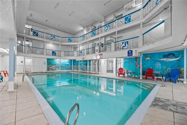 a kitchen with stainless steel appliances granite countertop a sink and stove