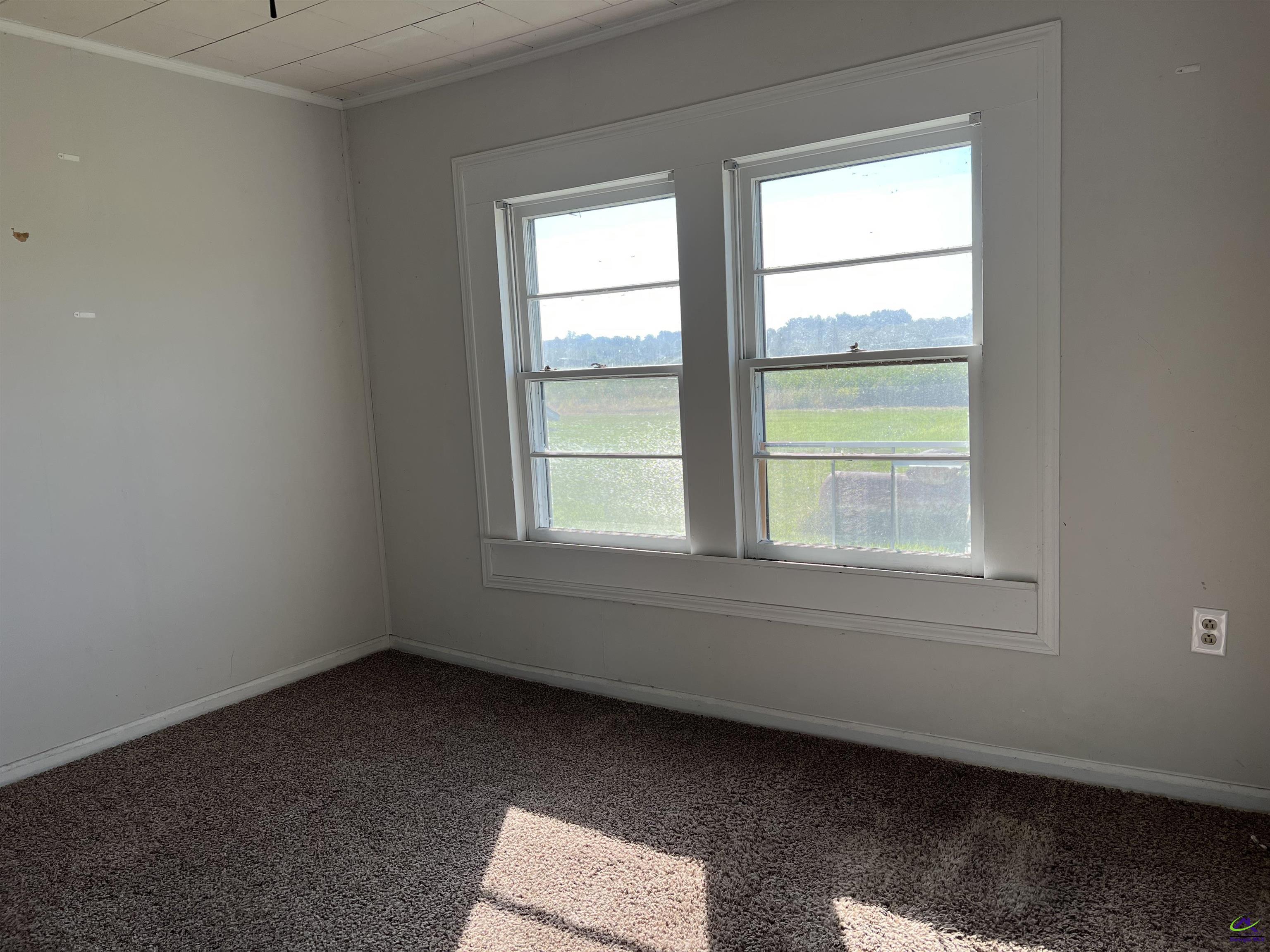 762 Nicholson-Carr Road Chester, GA 31012 - Photo 47 of 81 an empty room with a window