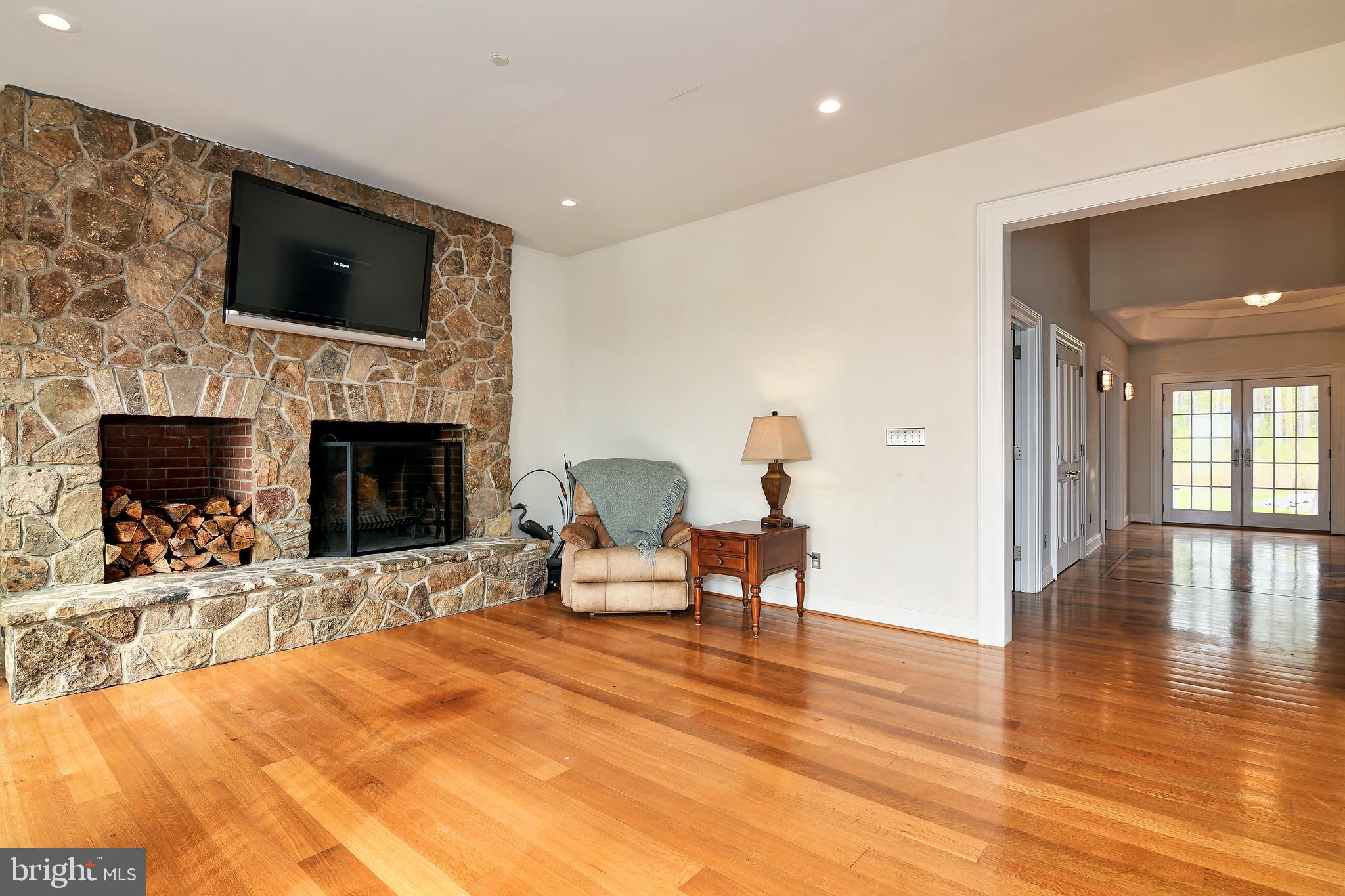 5040 Brooks Road Woolford, MD 21677 - Photo 15 of 76 Stone fireplace in great room