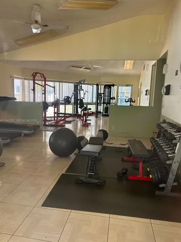 a room with lots of chairs and a projector