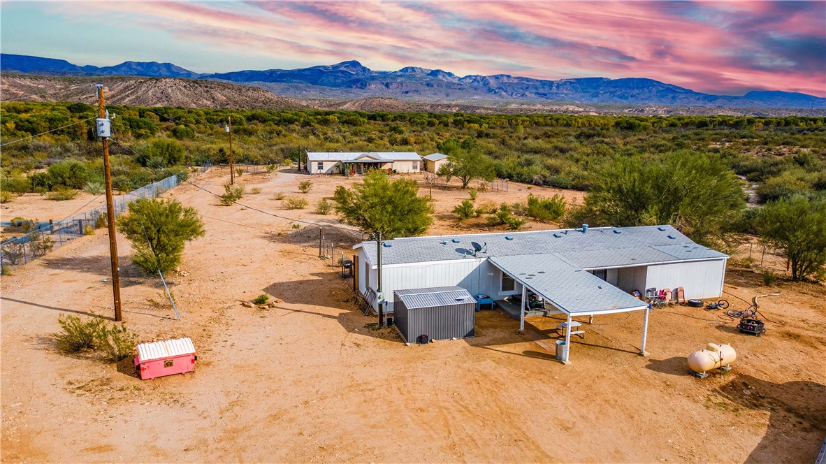 Aerial view showing both the main house and guest house