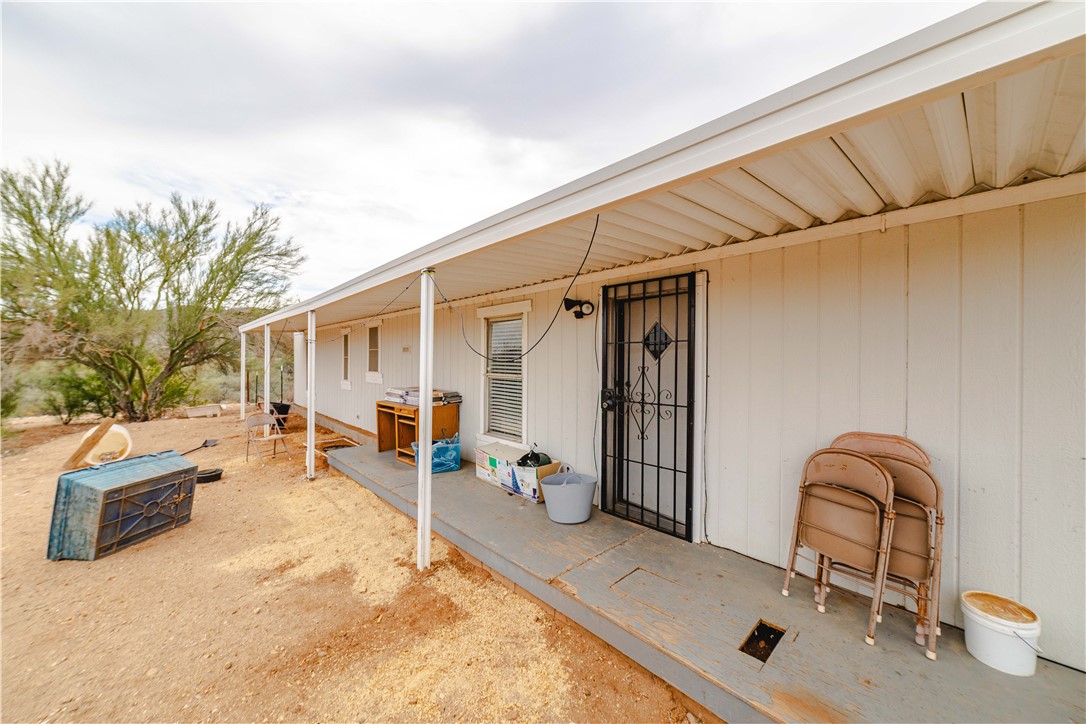 18488 Golf Course Avenue Wikieup, AZ 85360 - Photo 23 of 41 Guest house back patio area