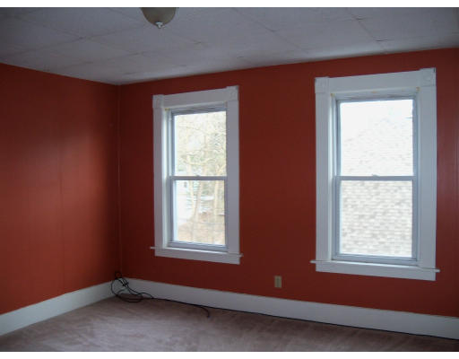 10 High Street Ayer, MA 01432 - Photo 3 of 8 an empty room with a window