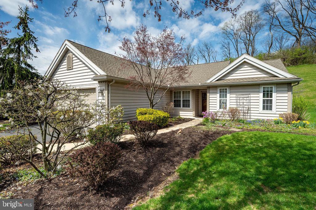 314 Charleston Lane Reading, PA 19610 - Photo 1 of 23 a front view of a house with garden