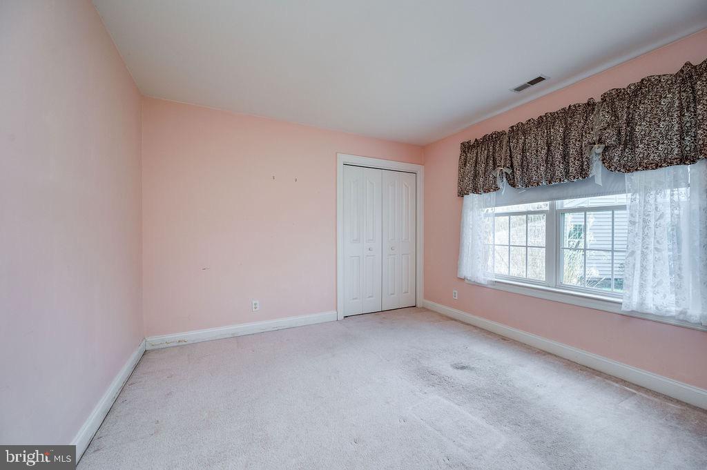 314 Charleston Lane Reading, PA 19610 - Photo 15 of 23 a view of an empty room with a window