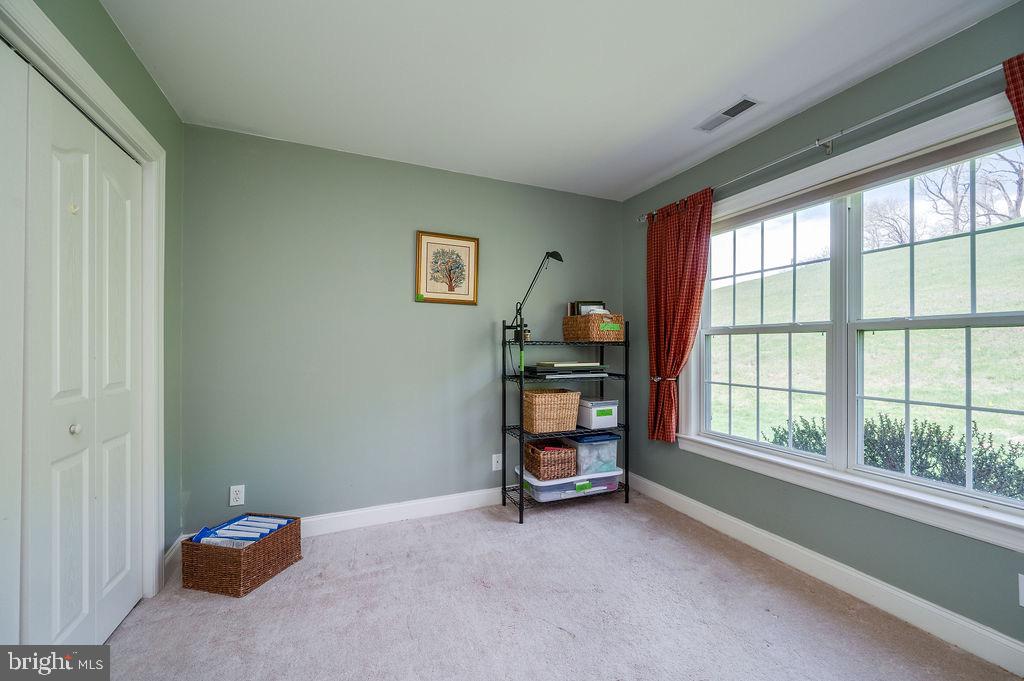 314 Charleston Lane Reading, PA 19610 - Photo 18 of 23 a room with a bed and a large window