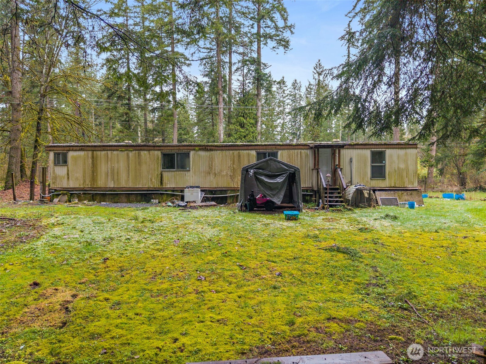 10618 Kelly Road Northeast Carnation, WA 98014 - Photo 11 of 16 a house view with a outdoor space