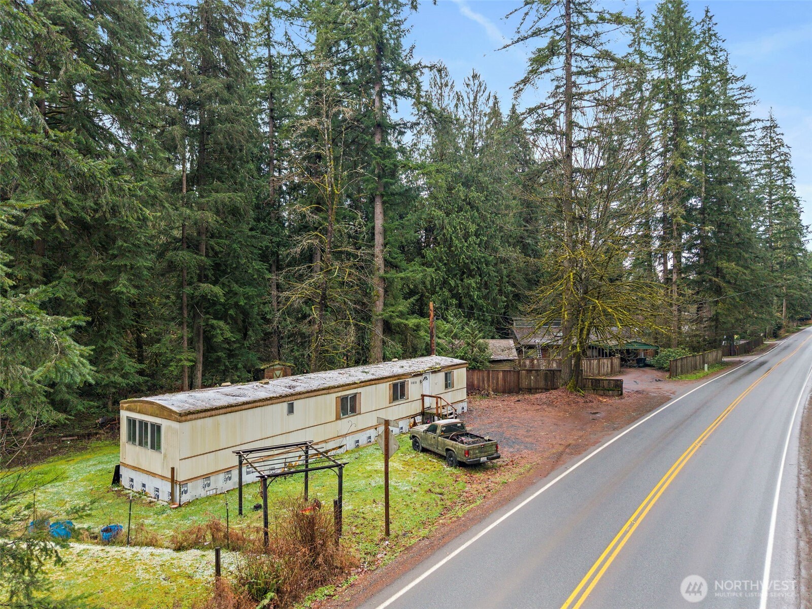 10618 Kelly Road Northeast Carnation, WA 98014 - Photo 15 of 16 a view of house with outdoor seating and city view