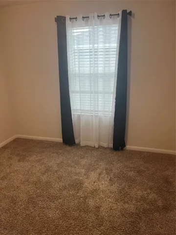 an empty room with an entryway