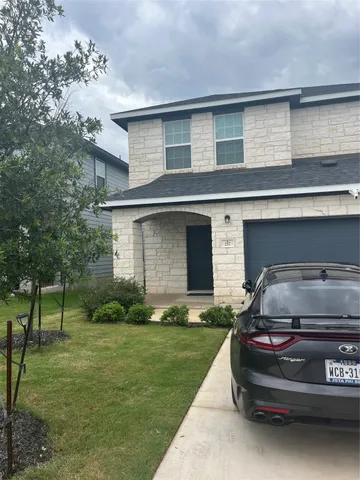 a car parked in front of a house