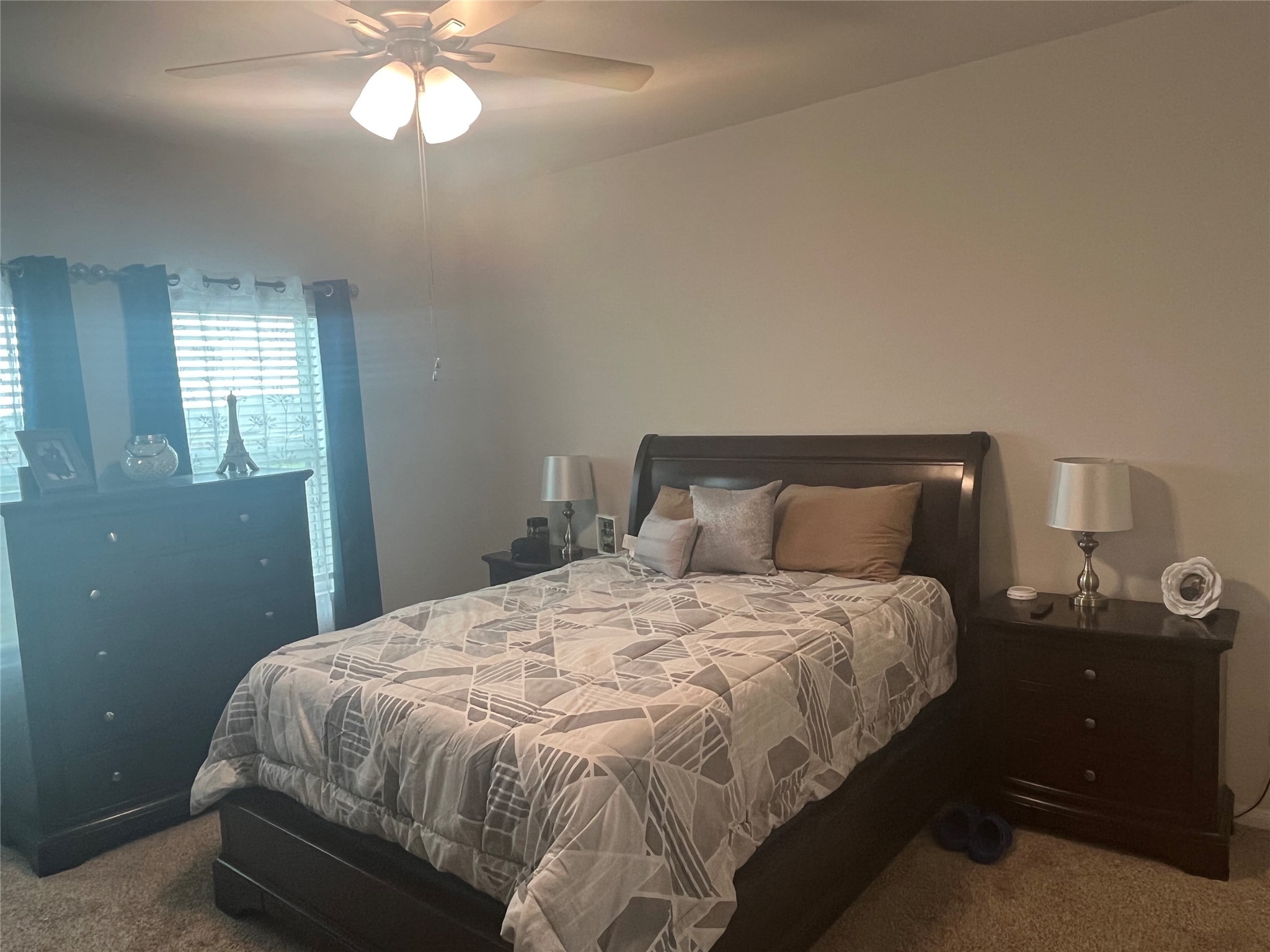 217 Lt. Rusty Jarrell, TX 76537 - Photo 24 of 28 a bedroom with a bed and a chandelier