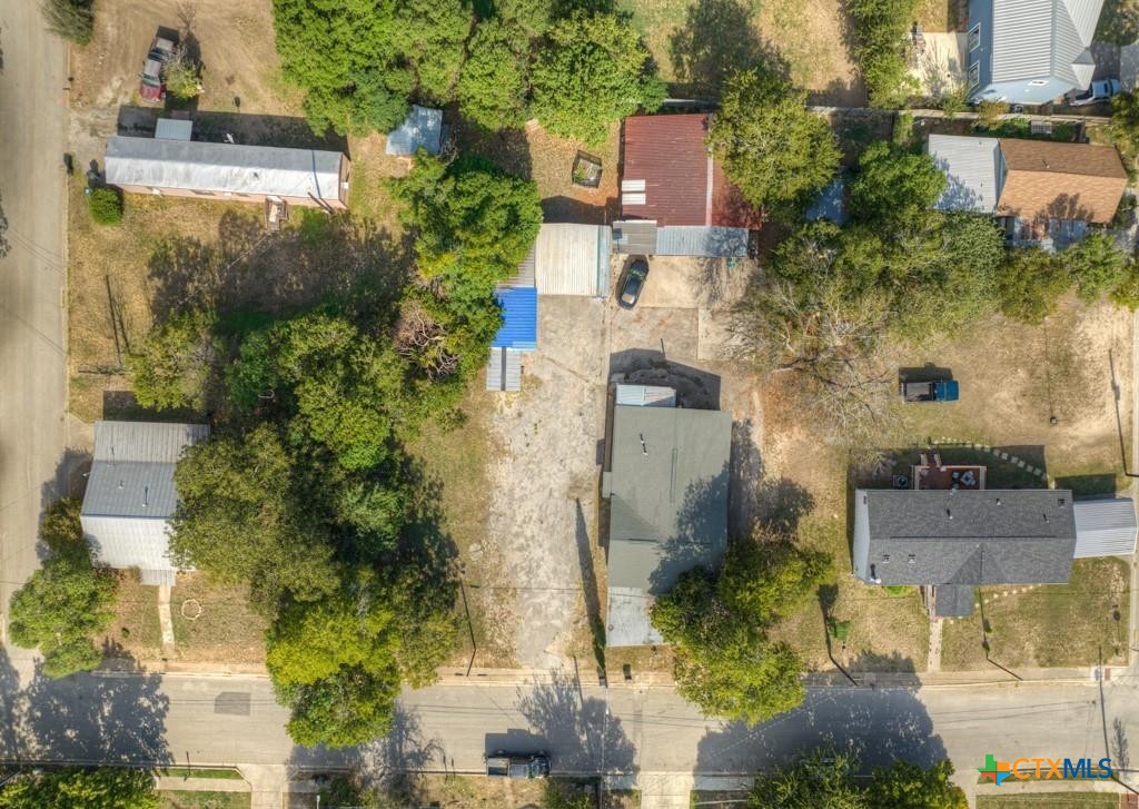 512 Valley Street San Marcos, TX 78666 - Photo 23 of 45 an aerial view of residential houses with outdoor space