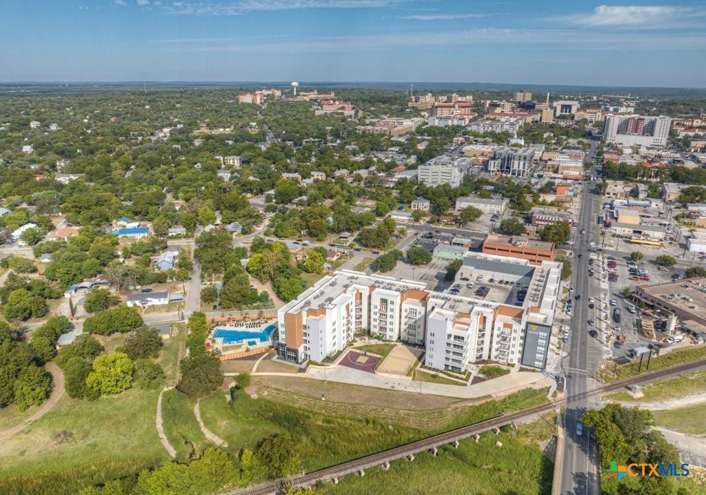 512 Valley Street San Marcos, TX 78666 - Photo 38 of 45 an aerial view of residential houses with outdoor space
