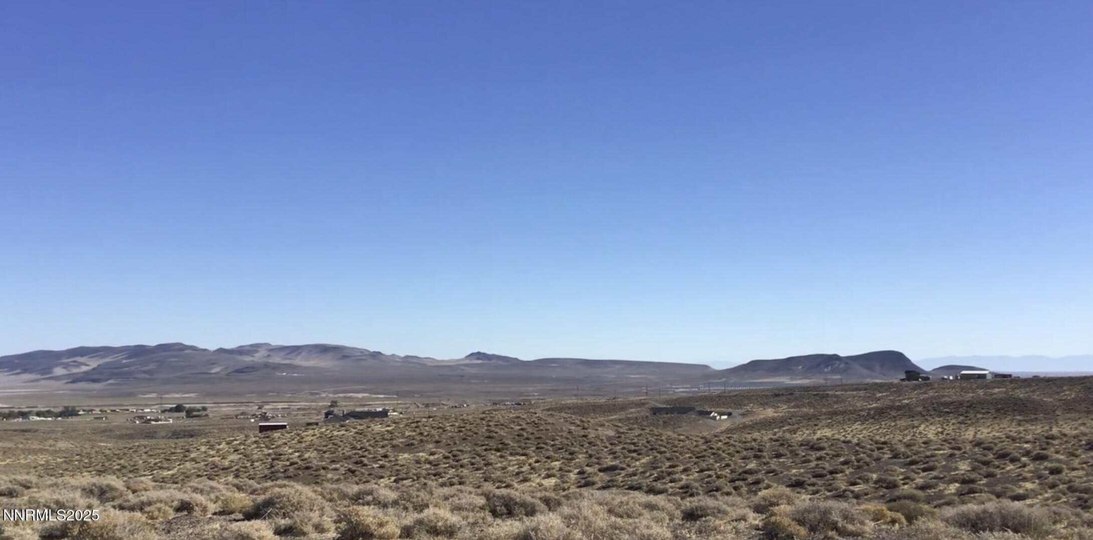 98 Alpine Drive Fernley, NV 89408 - Photo 11 of 11 a view of a mountain range with trees