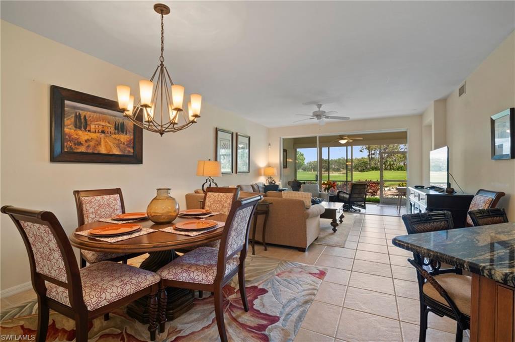 9281 Spring Run Boulevard, Unit 2607 Estero, FL 34135 - Photo 21 of 46 a view of a dining room with furniture
