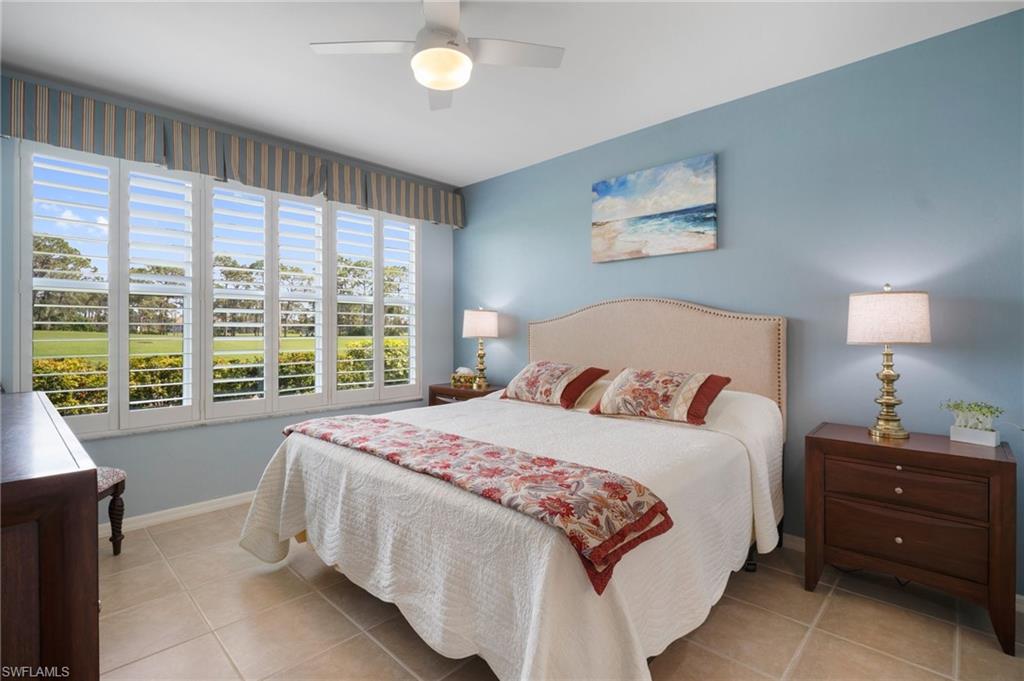 9281 Spring Run Boulevard, Unit 2607 Estero, FL 34135 - Photo 28 of 46 a bedroom with a bed and a window