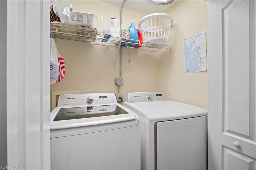 9281 Spring Run Boulevard, Unit 2607 Estero, FL 34135 - Photo 39 of 46 a utility room with dryer and washer