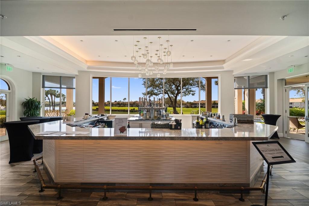 9281 Spring Run Boulevard, Unit 2607 Estero, FL 34135 - Photo 42 of 46 a view of a dining room with furniture