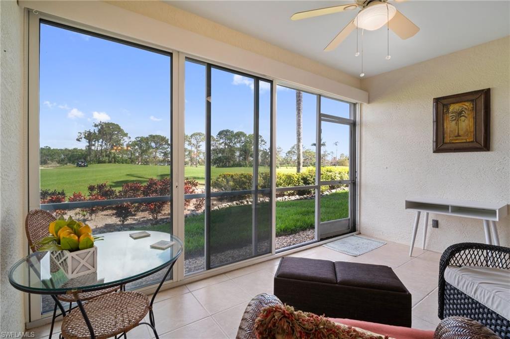 9281 Spring Run Boulevard, Unit 2607 Estero, FL 34135 - Photo 8 of 46 a bedroom with furniture and a large window