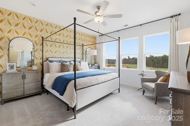 a bedroom with a bed and with outer view