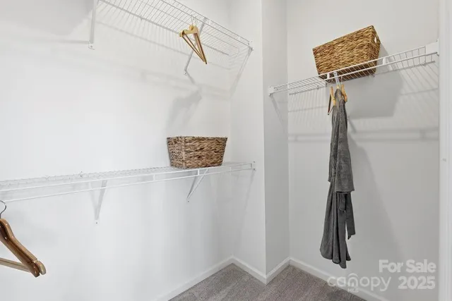 a room with furniture and a mirror