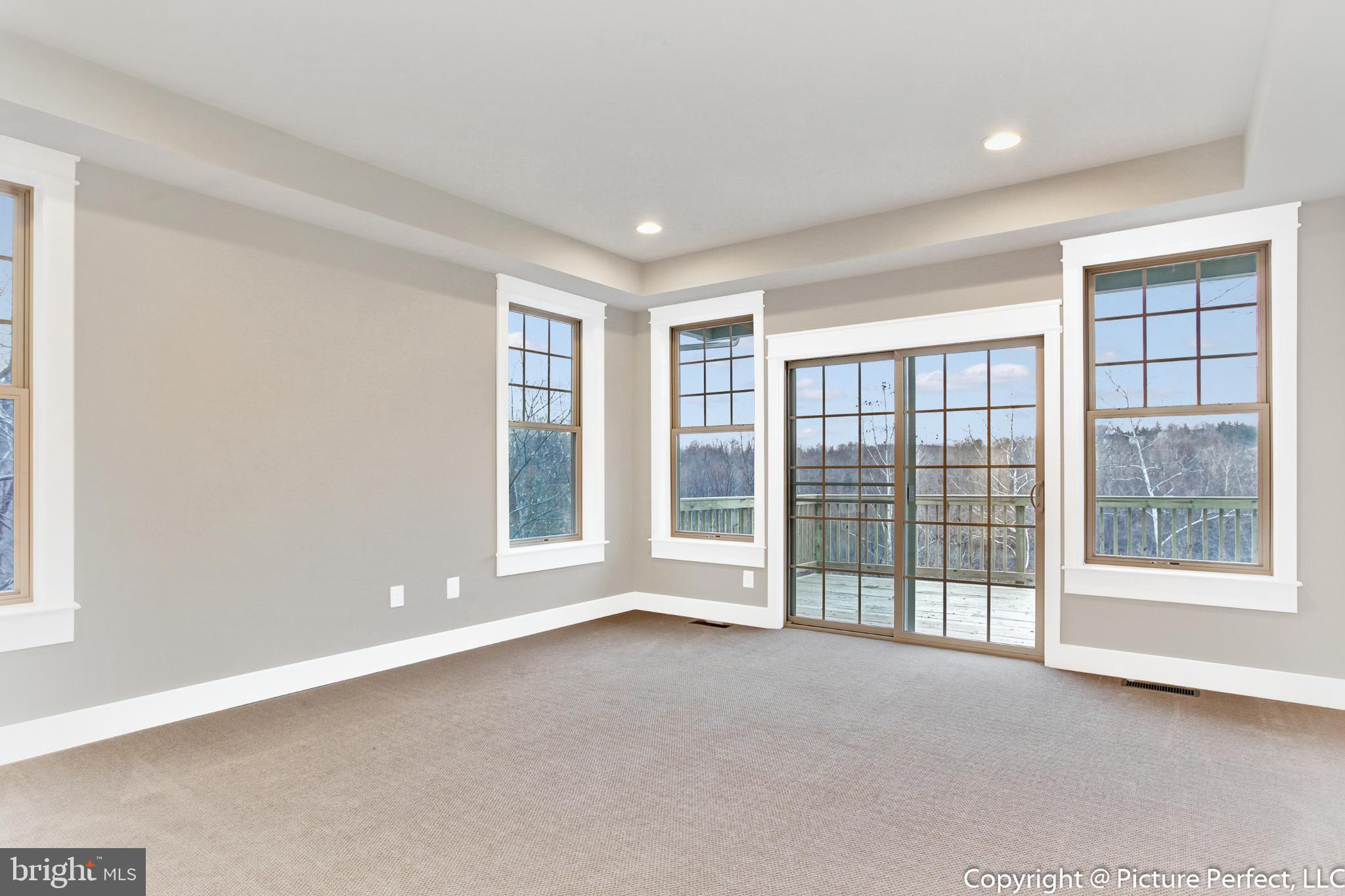 19507 Fisher Avenue, Unit (LOT 3) Poolesville, MD 20837 - Photo 13 of 36 Primary bedroom opens to deck.