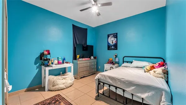 a bedroom with a bed and a bed