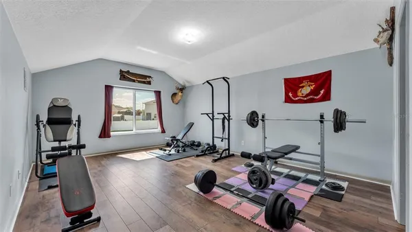 a view of a room with gym equipment