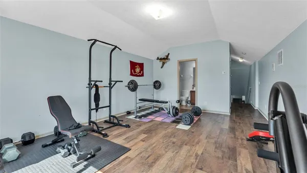 a view of a room with gym equipment