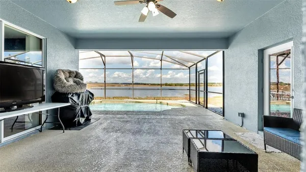 a view of living room with furniture and flat screen tv