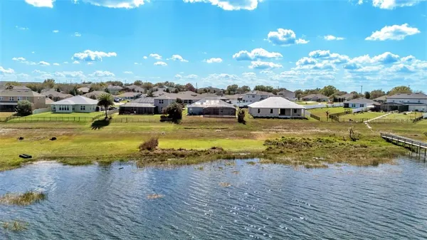 a view of a lake with a houses