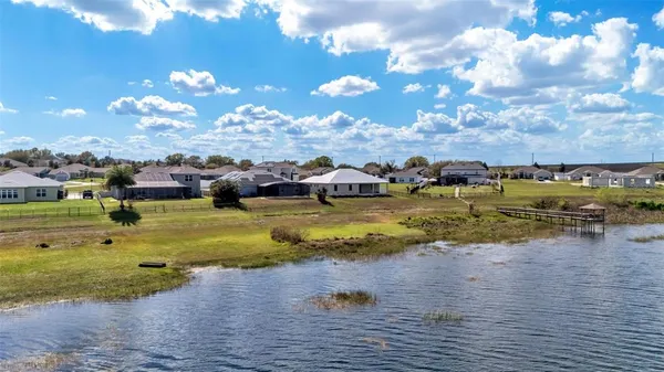 a view of a lake with houses