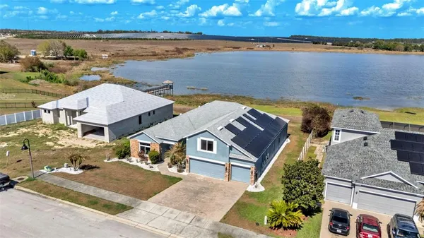a view of a lake with a building in the background