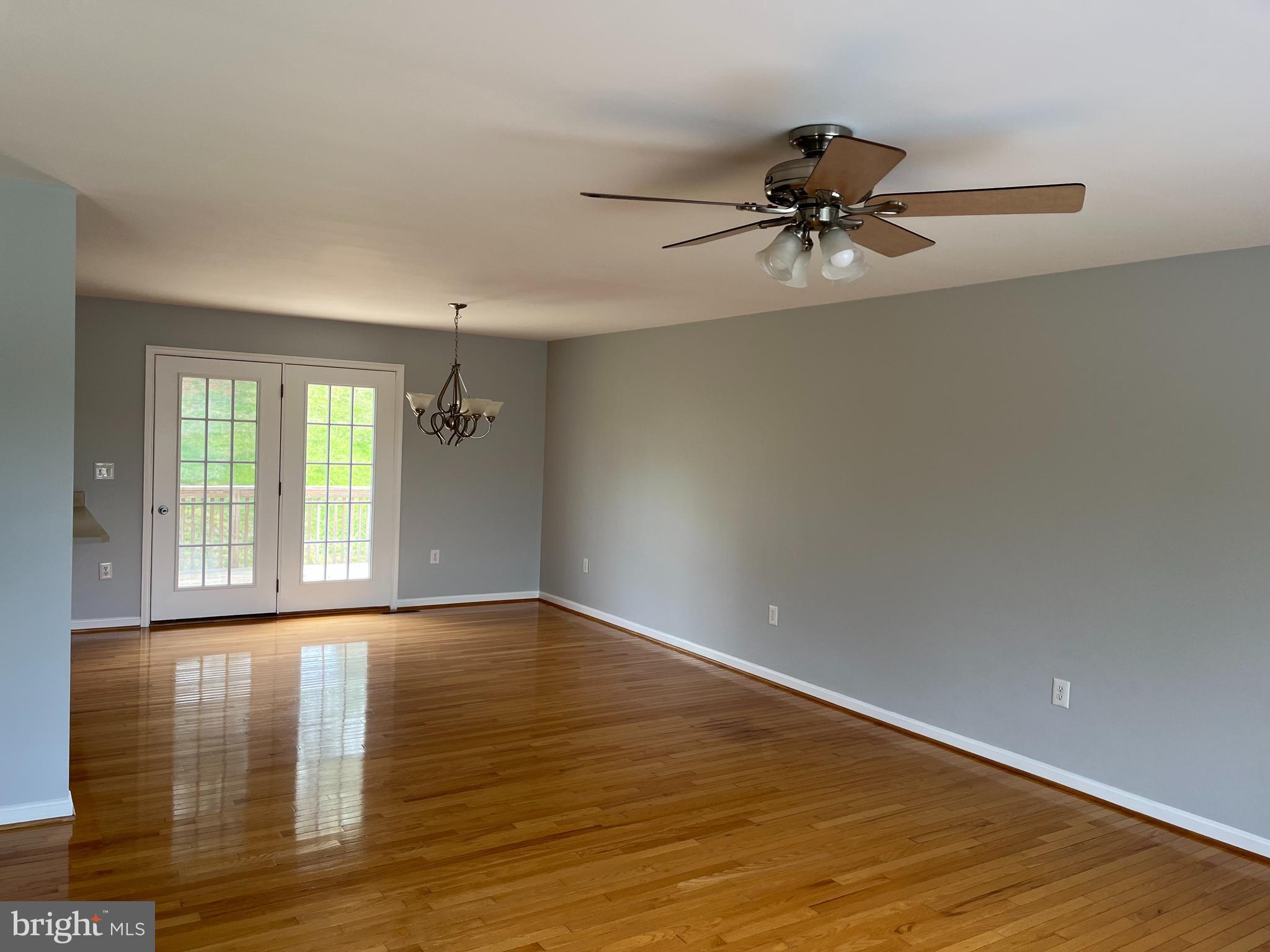 994 View Crest Court Front Royal, VA 22630 - Photo 7 of 24 a view of a room with wooden floor and a window