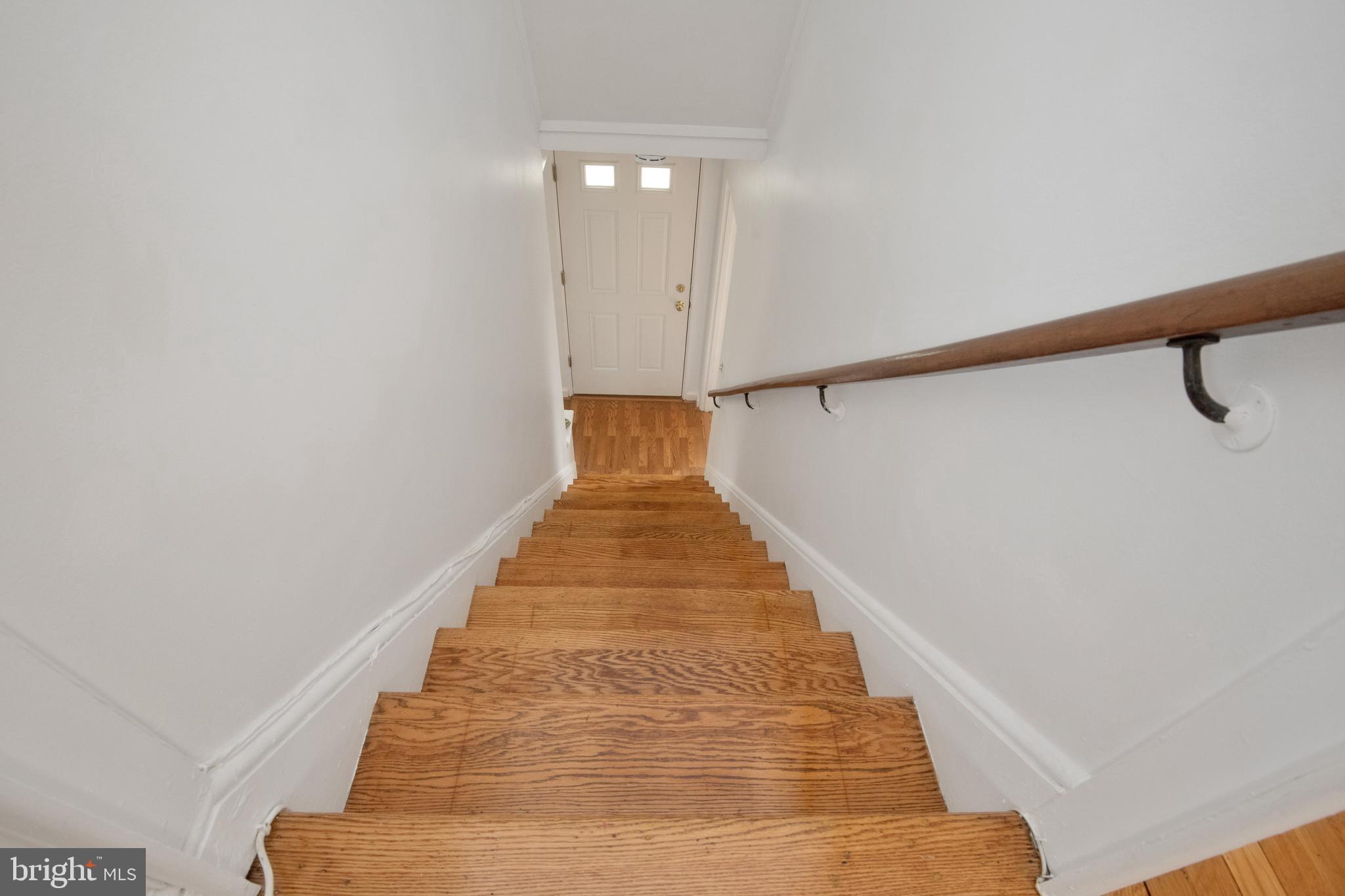 35 Ridge Road Greenbelt, MD 20770 - Photo 14 of 18 Refinished floors on steps
