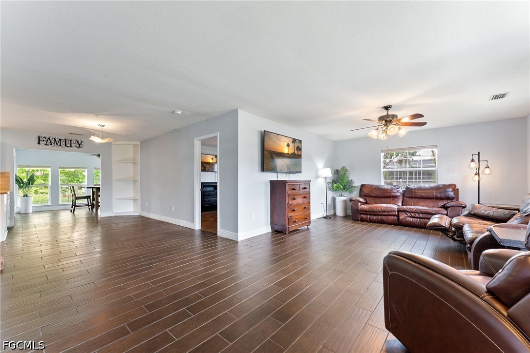17290 Rewis Road Alva, FL 33920 - Photo 5 of 50 a living room with furniture and wooden floor